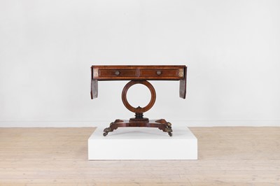 Lot 557 - A Regency rosewood, satinwood, and brass sofa table