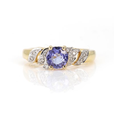 Lot 109 - An 18ct gold tanzanite and diamond ring