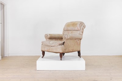 Lot 677 - An upholstered armchair