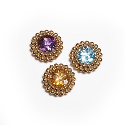 Lot 122 - A set of three gemstone slider pendants