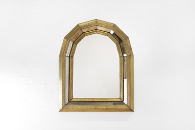 Lot 467 - A pressed brass-clad pier mirror
