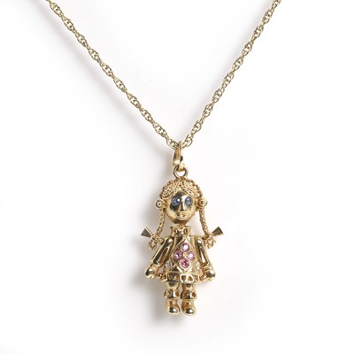 Lot 129 - A 9ct gold sapphire and diamond articulated doll pendant