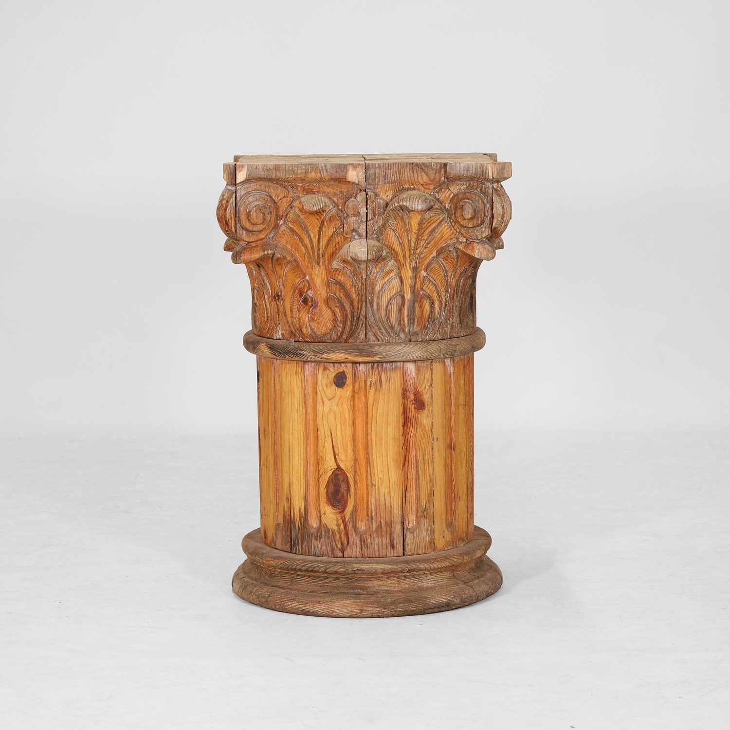 Lot 114 - A large laminated pine capital