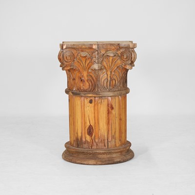 Lot 114 - A large laminated pine capital