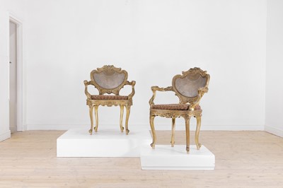 Lot 574 - A pair of Louis XV-style giltwood salon chairs