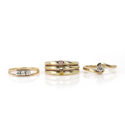 Lot 244 - A group of three 9ct gold rings