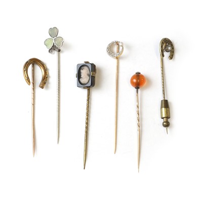 Lot 233 - A group of six stick pins
