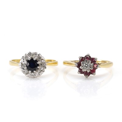 Lot 201 - A ruby and diamond cluster ring and a sapphire and diamond cluster ring