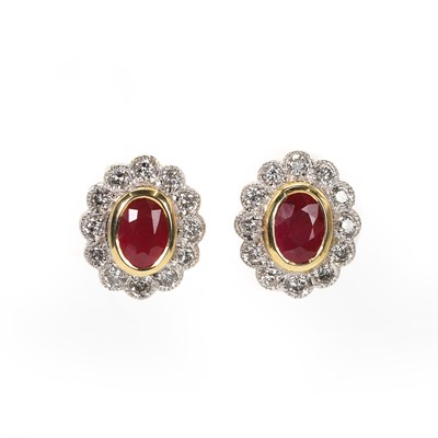 Lot 81 - A pair of ruby and diamond cluster stud earrings