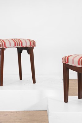 Lot 19 - Two George III-style upholstered mahogany stools