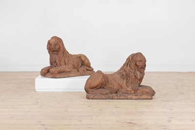 Lot 42 - A pair of terracotta recumbent lions