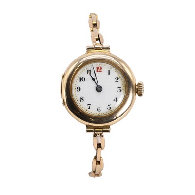 Lot 413 - A ladies' 9ct gold mechanical bracelet watch