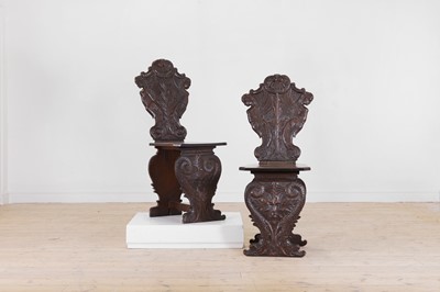 Lot 222 - A pair of Renaissance-style walnut sgabello hall chairs