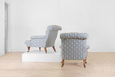 Lot 549 - A matched pair of early Victorian club armchairs by Howard & Sons