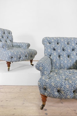 Lot 549 - A matched pair of early Victorian club armchairs by Howard & Sons