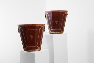 Lot 185 - A matched pair of embossed leather wastepaper bins