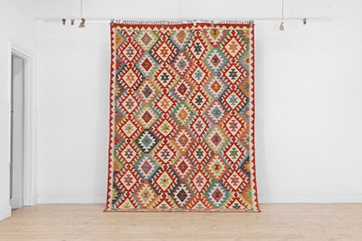 Lot 686 - A kilim flat-weave wool rug