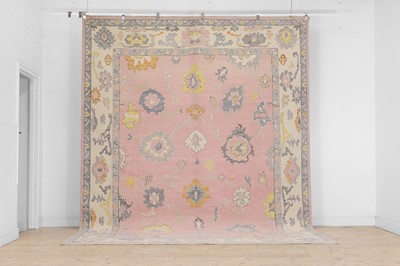 Lot 375 - An Oushak wool carpet