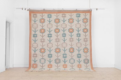 Lot 599 - A Colefax and Fowler-inspired flat-weave wool carpet
