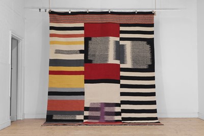 Lot 489 - A Bauhaus-inspired flat-weave wool carpet