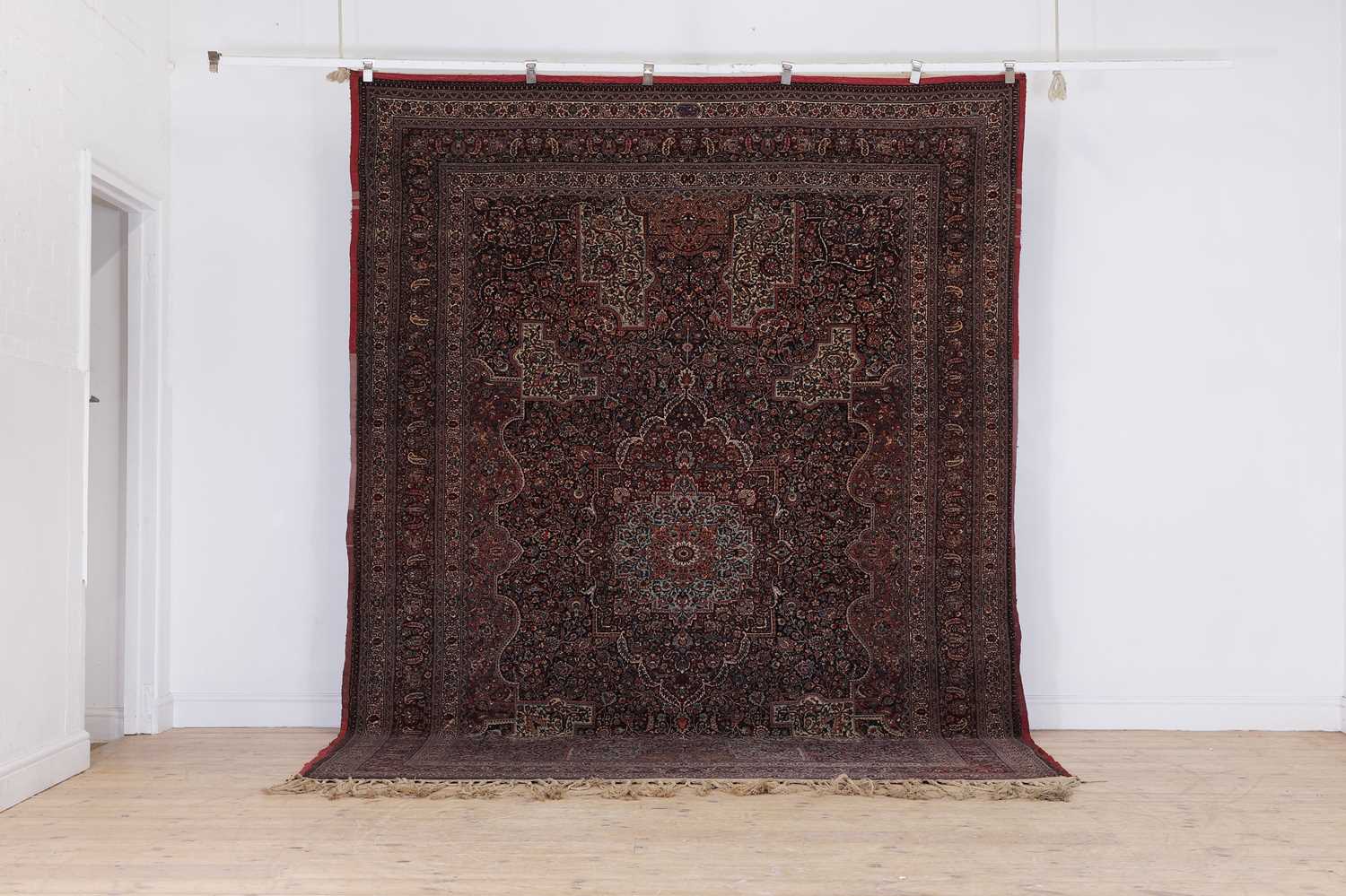 Lot 513 - A Persian Mashad Amoghli wool carpet