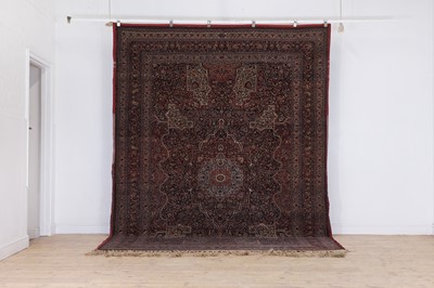Lot 513 - A Persian Mashad Amoghli wool carpet