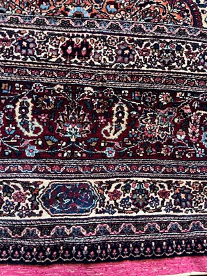 Lot 513 - A Persian Mashad Amoghli wool carpet