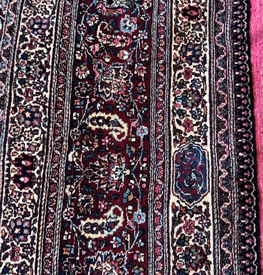 Lot 513 - A Persian Mashad Amoghli wool carpet