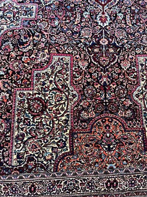 Lot 513 - A Persian Mashad Amoghli wool carpet
