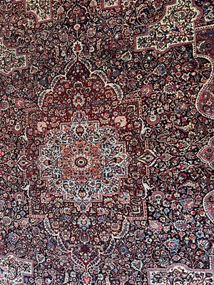 Lot 513 - A Persian Mashad Amoghli wool carpet