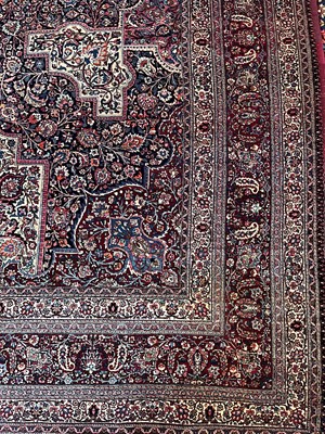 Lot 513 - A Persian Mashad Amoghli wool carpet