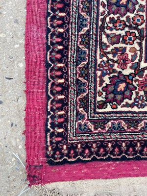 Lot 513 - A Persian Mashad Amoghli wool carpet