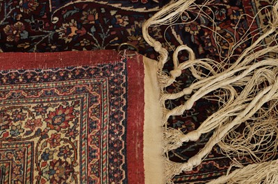 Lot 513 - A Persian Mashad Amoghli wool carpet