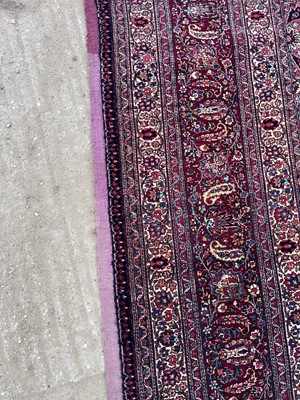 Lot 513 - A Persian Mashad Amoghli wool carpet