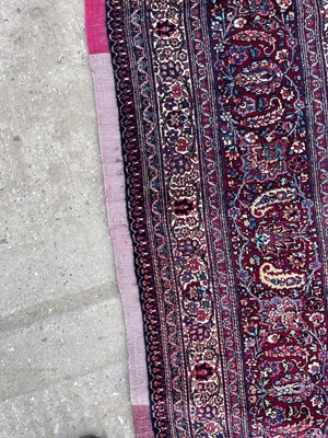 Lot 513 - A Persian Mashad Amoghli wool carpet