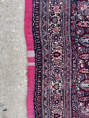 Lot 513 - A Persian Mashad Amoghli wool carpet