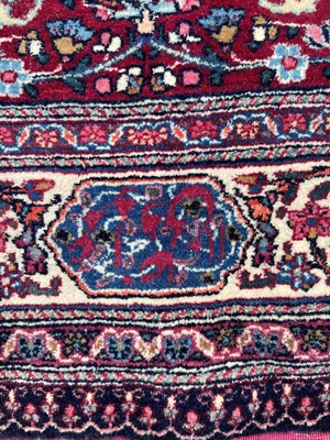Lot 513 - A Persian Mashad Amoghli wool carpet