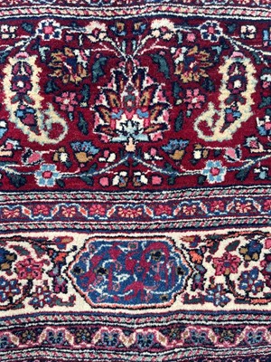 Lot 513 - A Persian Mashad Amoghli wool carpet