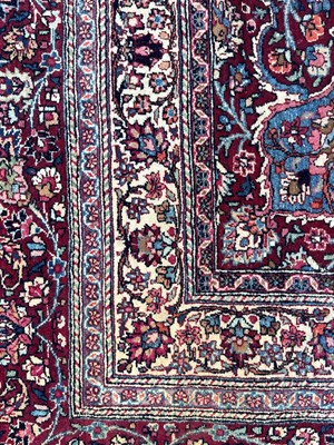 Lot 513 - A Persian Mashad Amoghli wool carpet