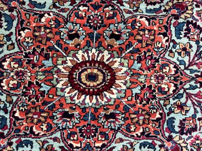 Lot 513 - A Persian Mashad Amoghli wool carpet