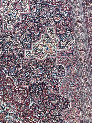 Lot 513 - A Persian Mashad Amoghli wool carpet