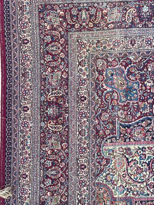 Lot 513 - A Persian Mashad Amoghli wool carpet