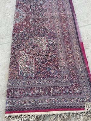 Lot 513 - A Persian Mashad Amoghli wool carpet