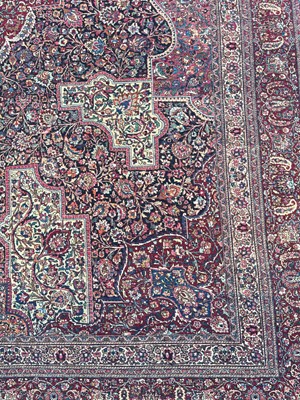 Lot 513 - A Persian Mashad Amoghli wool carpet