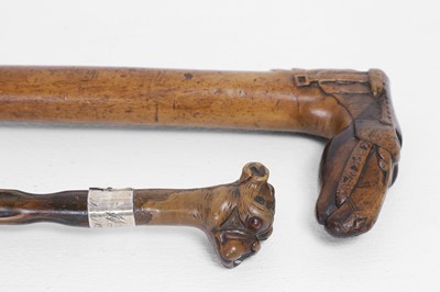 Lot 251 - A carved olivewood walking stick