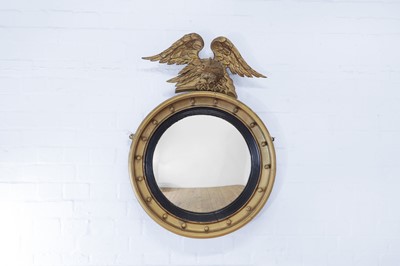 Lot 214 - A Regency-style giltwood convex mirror