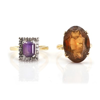 Lot 246 - An amethyst and diamond cluster ring and a smoky quartz ring