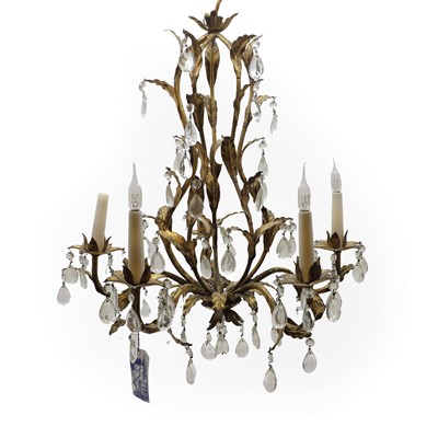 Lot 533 - A gilt metal and glass chandelier