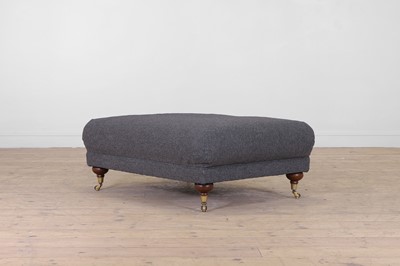 Lot 302 - An upholstered footstool by Parker Knoll