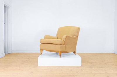 Lot 513 - An upholstered armchair in the Howard & Sons style
